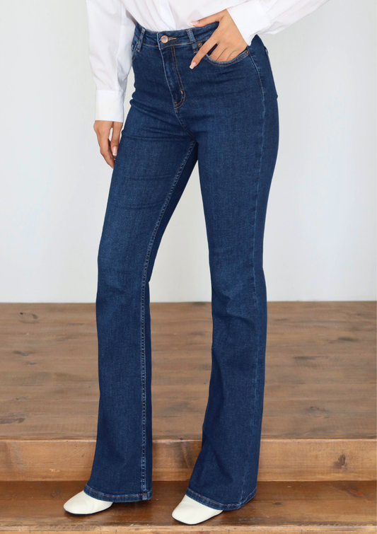 Lara Dark Blue Flare Jean — half body side view showing high-rise waist and flare silhouette in dark blue wash | Mia & Luna