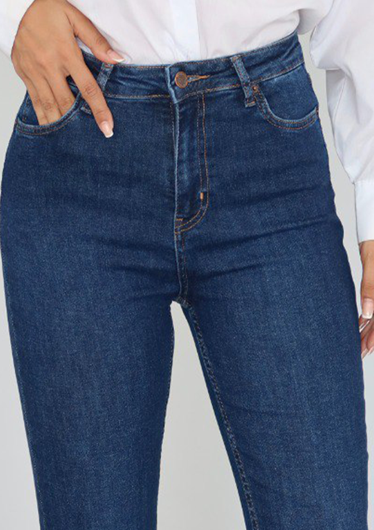 Lara Dark Blue Flare Jean — close up of front waist detail showing high-rise waistband and zip fly with button closure in dark blue wash | Mia & Luna
