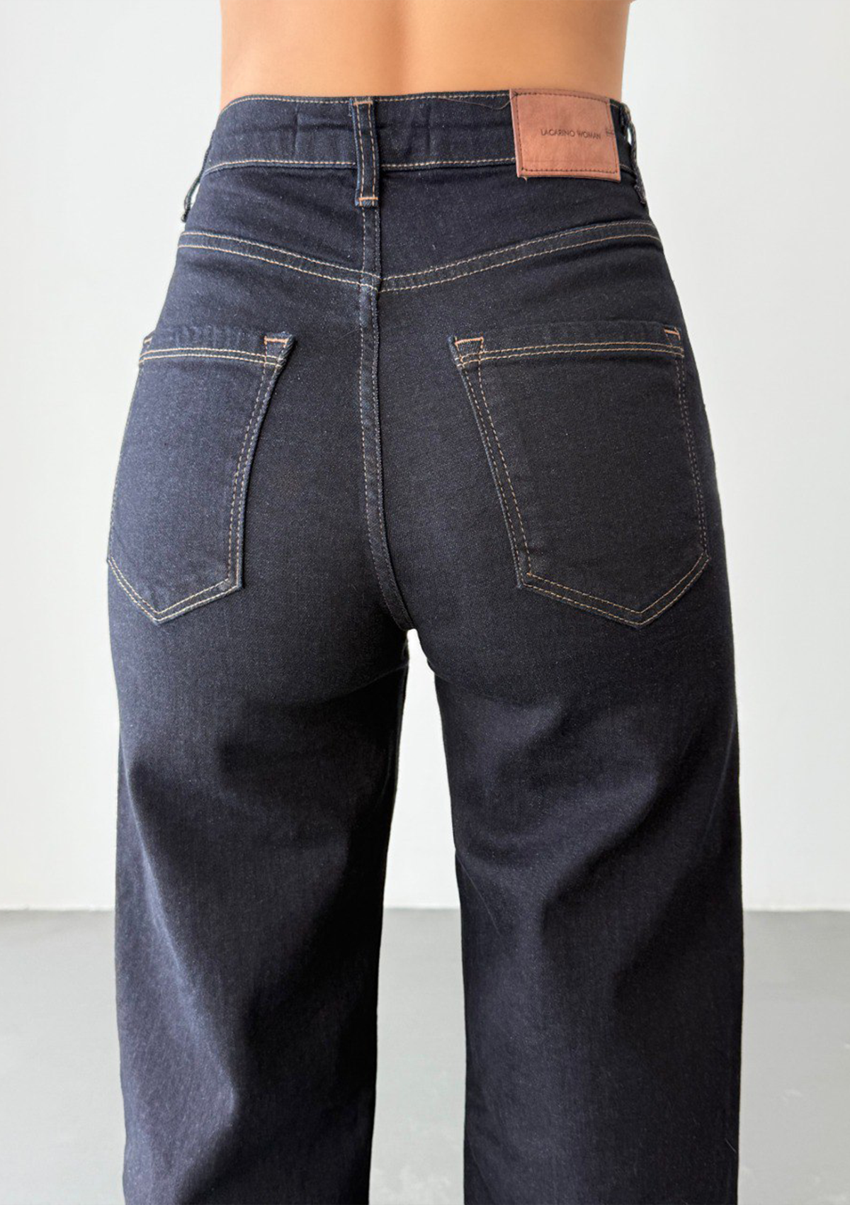 Nita Dark Rinse Straight Jean — close up back view showing five-pocket detail, contrast stitching and deep rinse wash finish | Mia & Luna