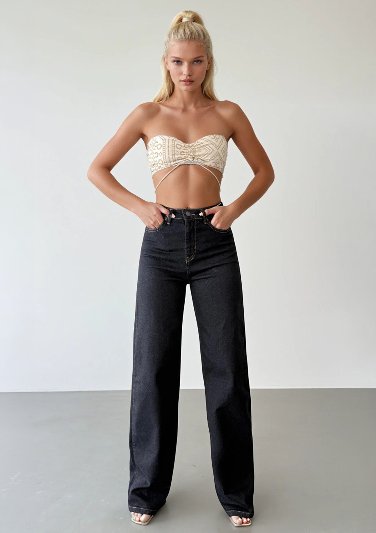 Nita Dark Rinse Straight Jean — full length front facing styled pose with model's hands in pockets, showcasing high-rise waist and straight leg silhouette in deep rinse wash | Mia & Luna