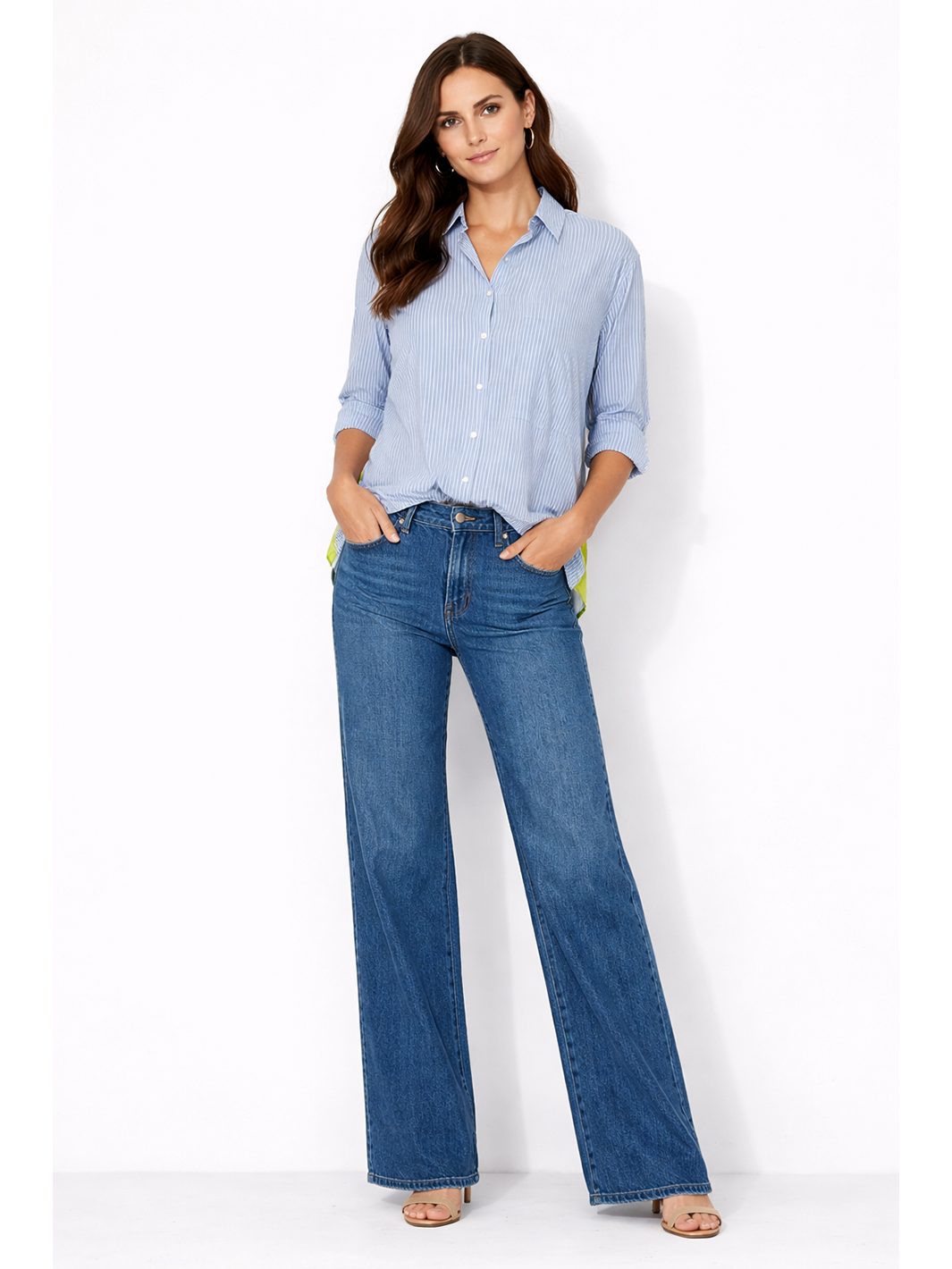 Sienna Stripe Shirt Light Blue — full body front facing view with shirt slightly tucked styled with jeans, model with hands in pockets | Mia & Luna