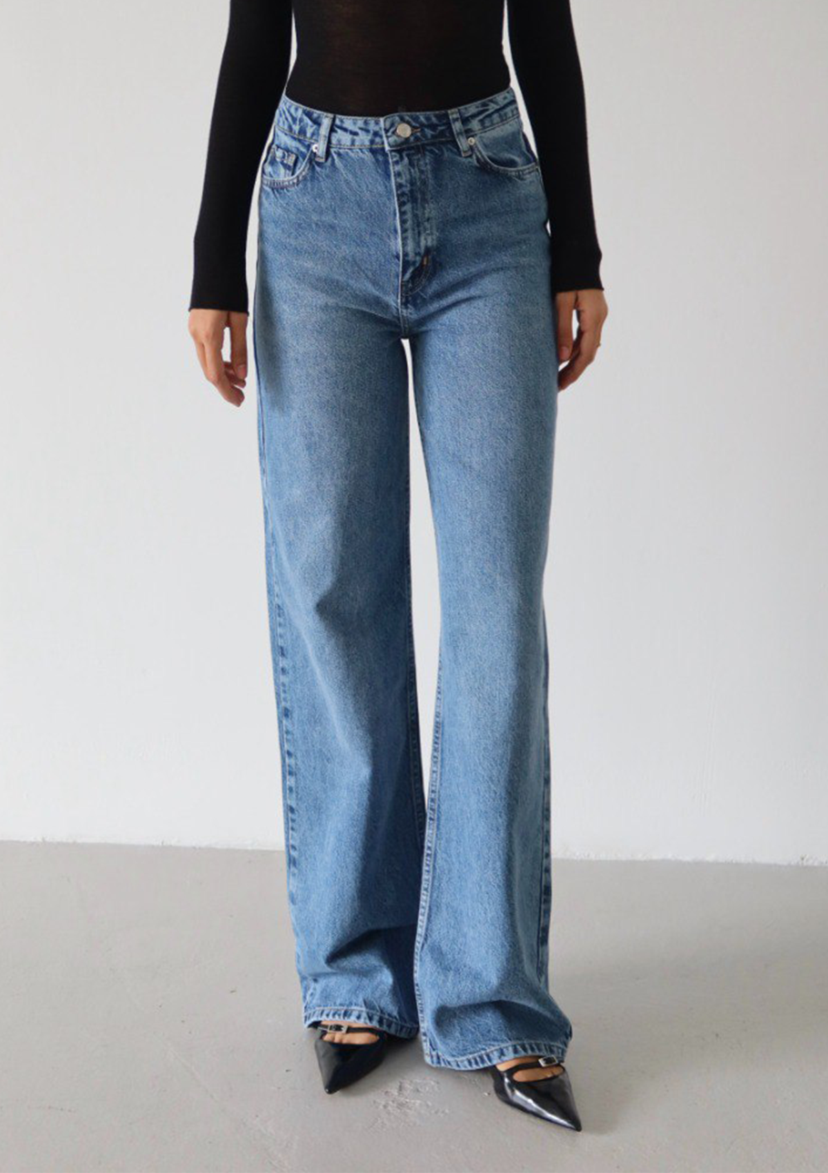 Elia Wide Leg Jean in light blue — half body front view showing high-rise waist and wide leg | Mia & Luna