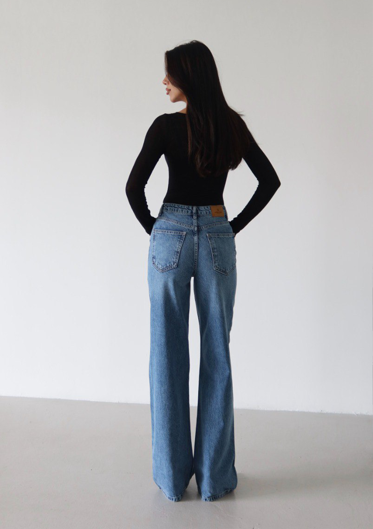 Elia Wide Leg Jean in light blue — full body back view showing wide leg silhouette | Mia & Luna